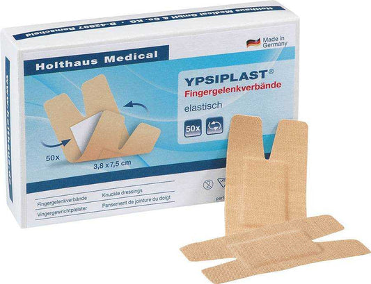 Fingergelenkverband YPSIPLAST® elastisch 3,8 x 7,5 cm 50 Stück von Holthaus Medical in Originalverpackung mit einzeln entfalteter Bandage im Vordergrund. Ideal für Erste Hilfe bei Fingerverletzungen.